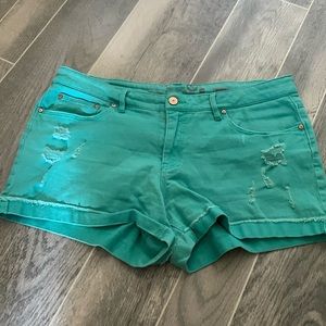 Teal distressed shorts